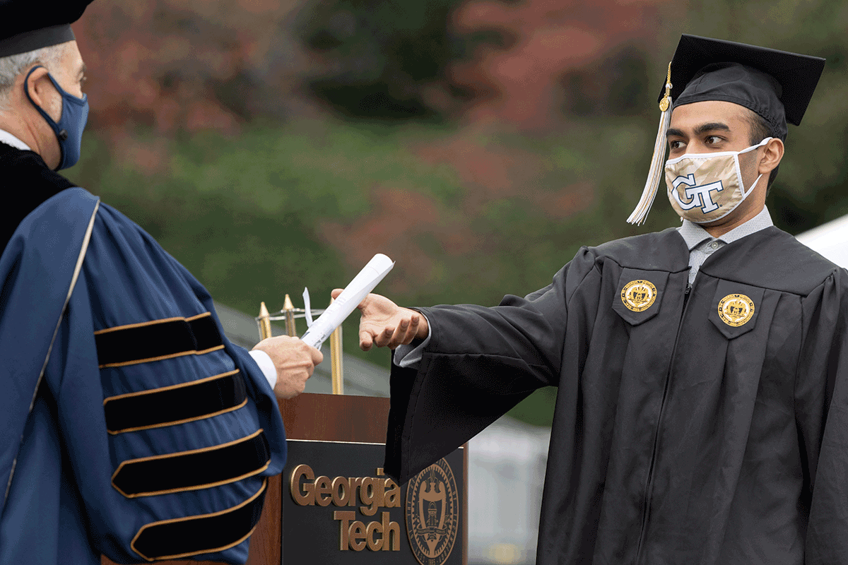 Graduate receiving diploma